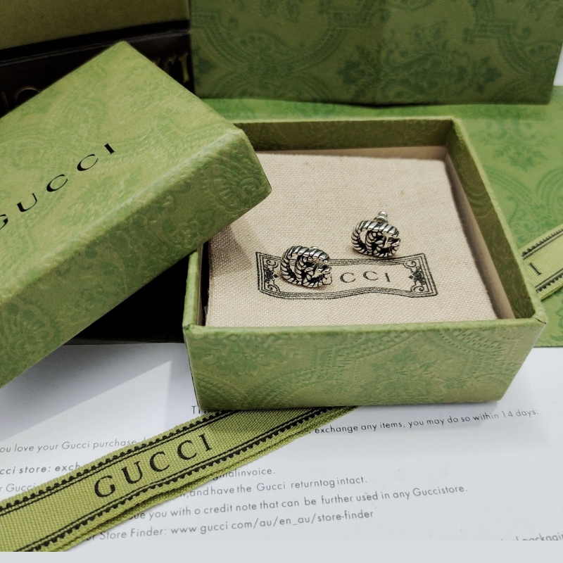 G*u*i earrings